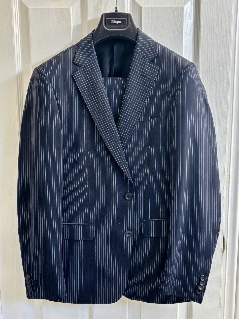 Navy Zegna Suit with white pinstripe.